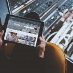 A businessman explores EsteticaExport.com website on his tablet